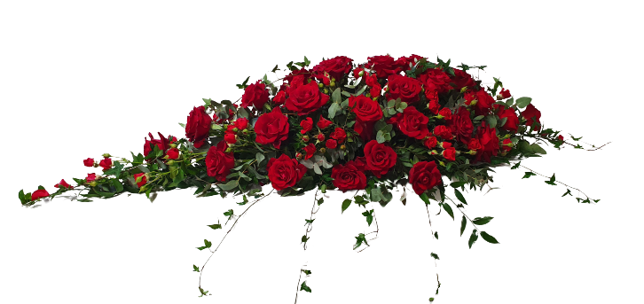 kistedekorasjon med røde roser og sesongens grønt