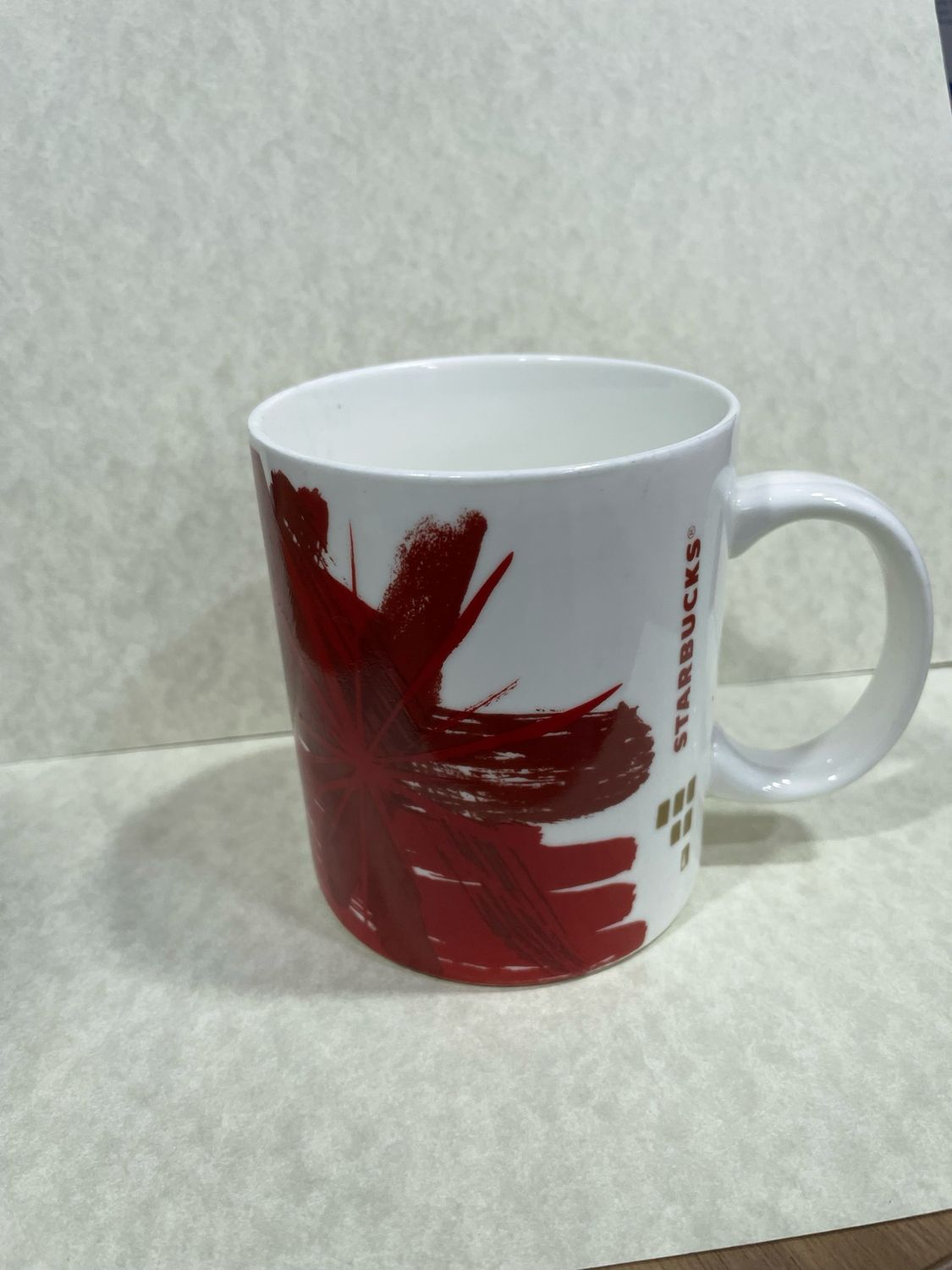 Red and white Starbucks Mug