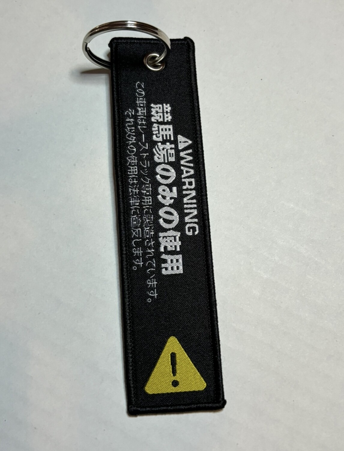 Caution Race track use only Jet Tag
