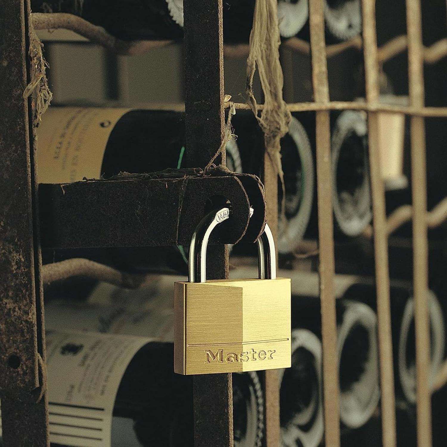 Master Lock 1-1/4 in. H X 5/16 in. W X 1-9/16 in. L Brass 4-Pin Tumbler Exterior Padlock