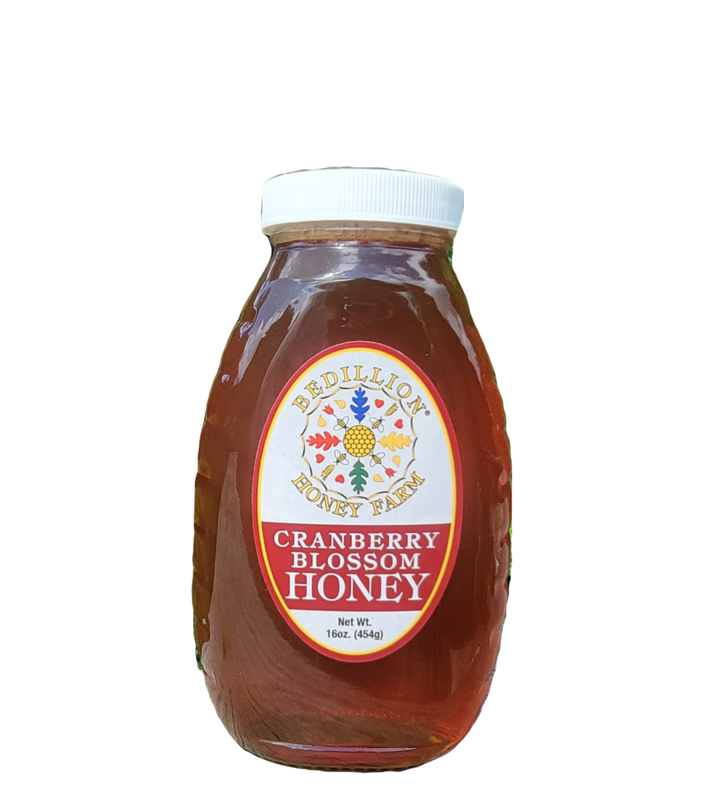 16 oz glass jar of cranberry blossom honey
