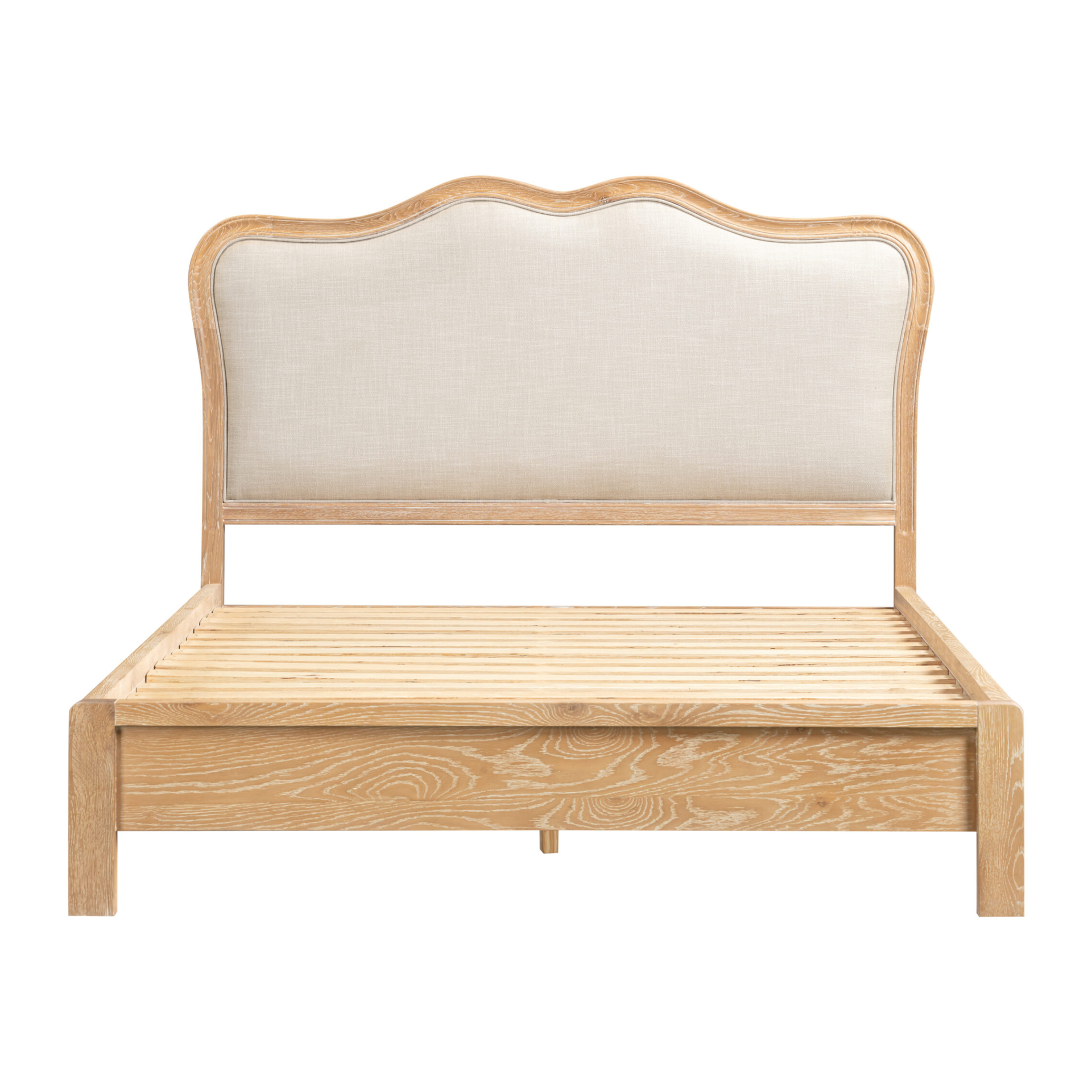 A wooden bed with white wash oak and a linen style padded headboard - side facing image.