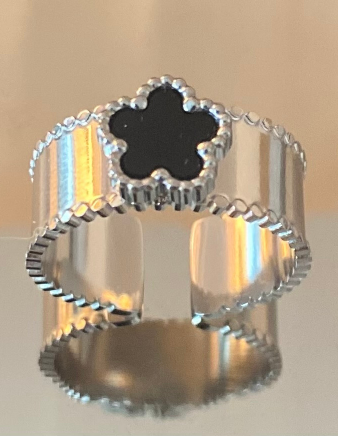Anillo flores negro plata
