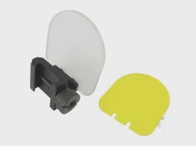Flip up scope / sight protector with clear and yellow lens