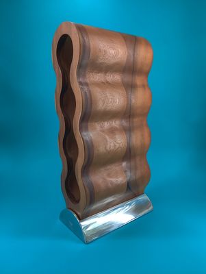 The darkish wood pairs with the shiny metal base.