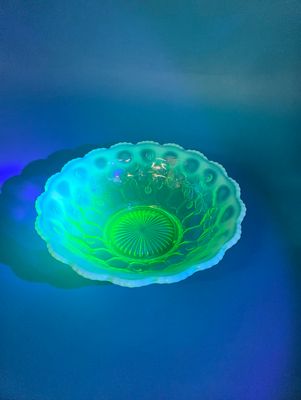Slightly muted glow under UV light.