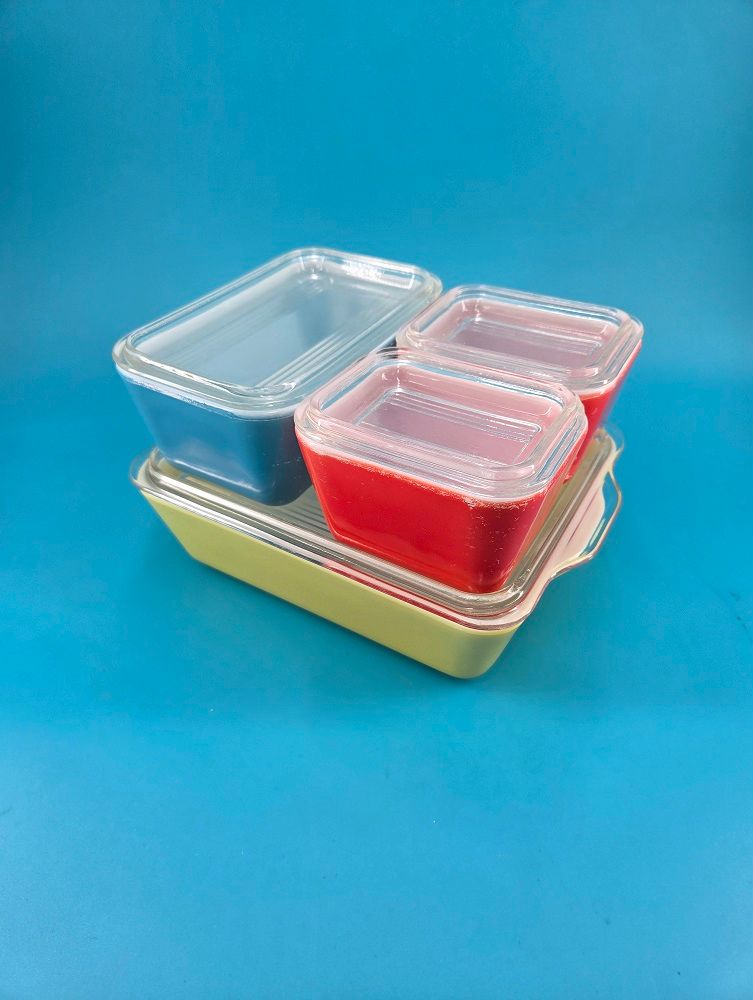 Blue, orange, and yellow stackable containers.