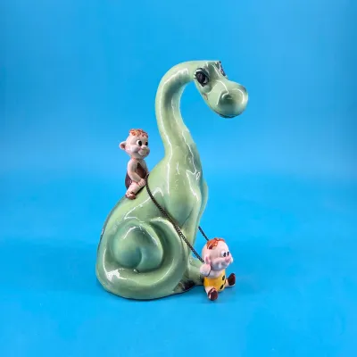 Kreiss & Co. Psycho Ceramics Green Dinosaur with Caveman
