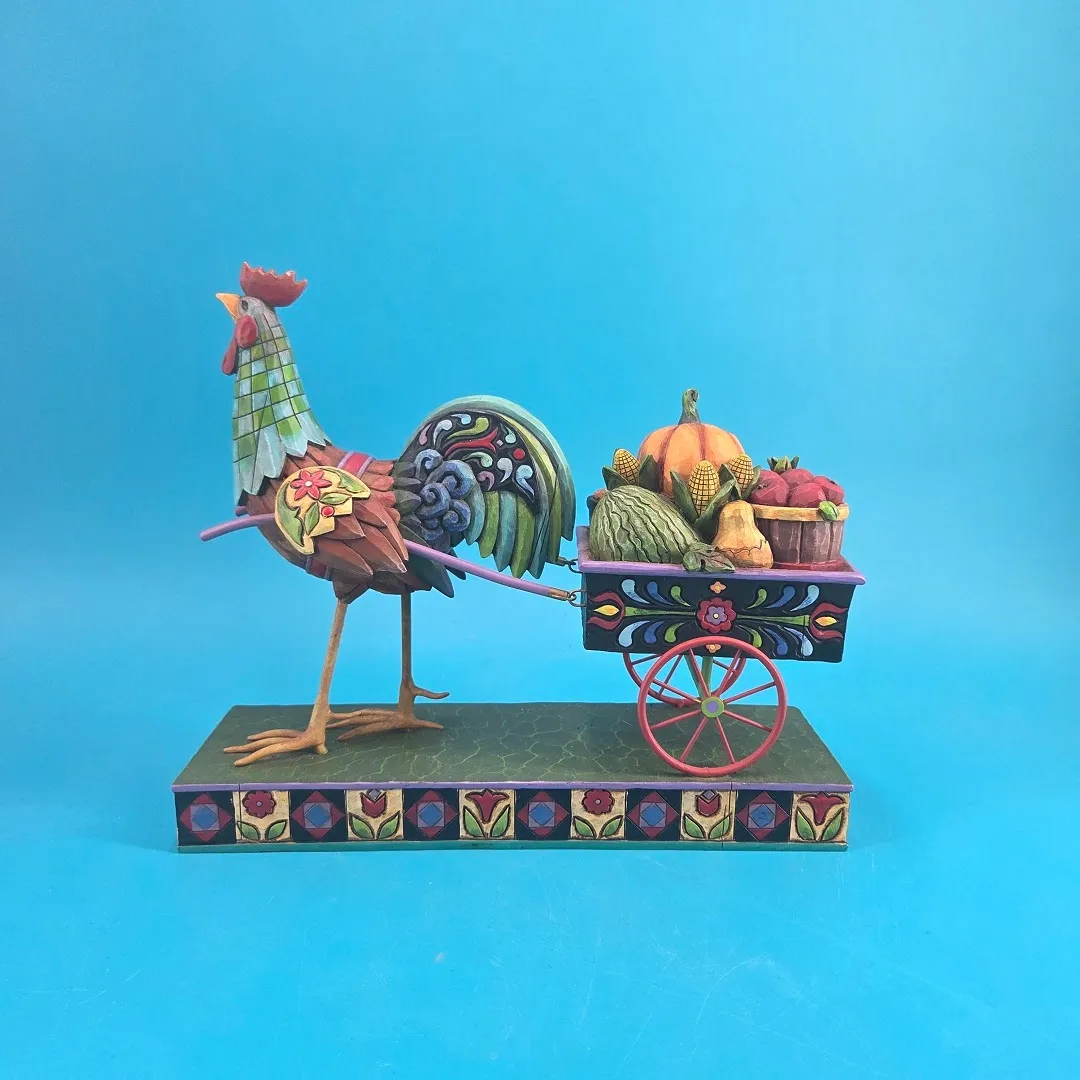 A rooster pulling a cart of vegetables.