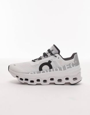 ON Cloudmonster running trainers in white