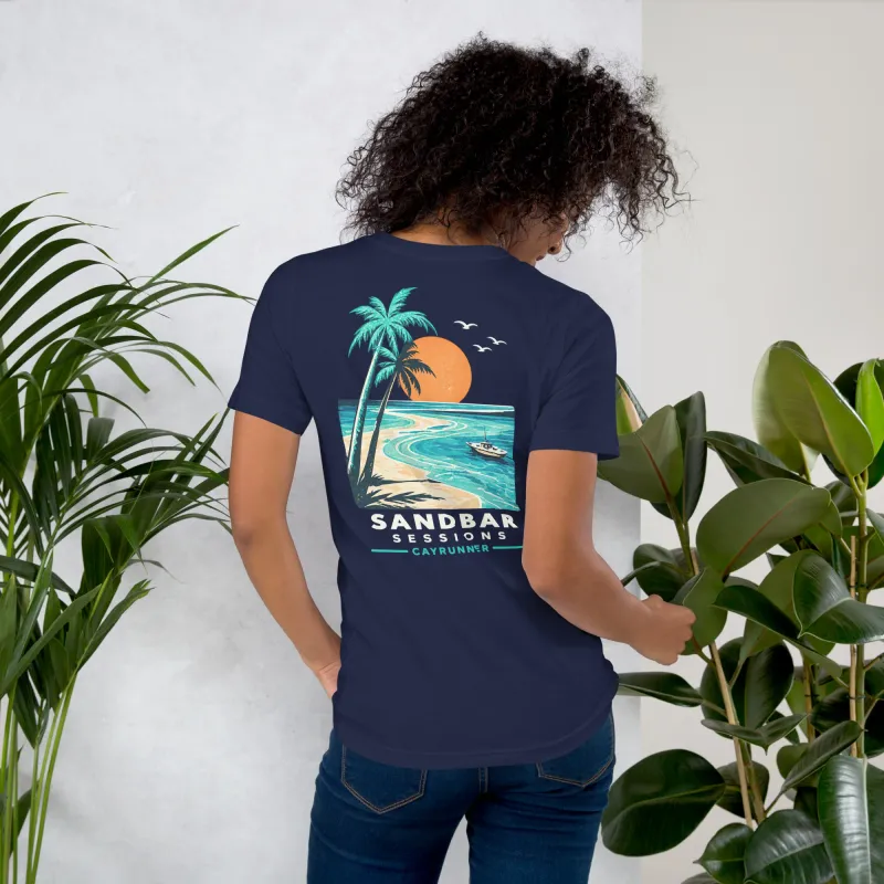 Woman among plants wearing the Cayrunner Salty Ways Unisex T-Shirt in navy, showing back palm tree beach design