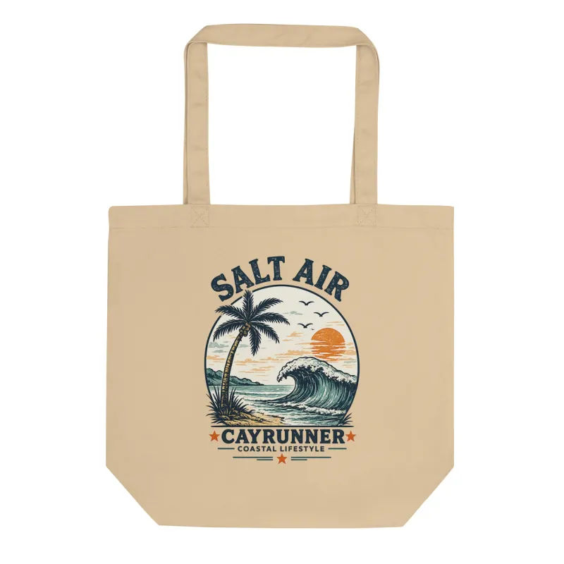 Cayrunner Salt Air organic cotton tote bag in tan with wave, palm tree, and sunset design