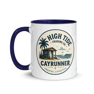 Cayrunner High Tide Trading Co. coffee mug with dark blue handle, featuring a vintage surf shop badge design.
