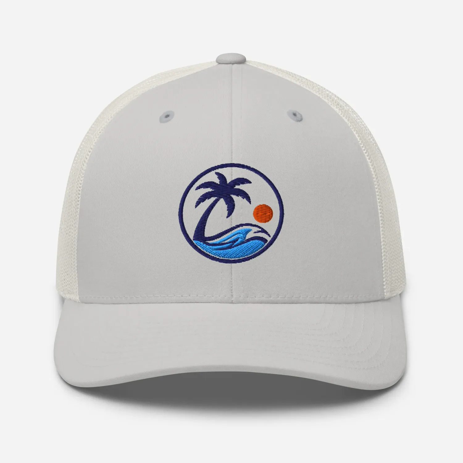 Cayrunner Brand Mark Trucker Cap in silver with embroidered navy circle, palm tree, orange sun, and blue wave