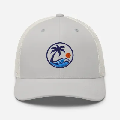 Cayrunner Brand Mark Trucker Cap in silver with embroidered navy circle, palm tree, orange sun, and blue wave