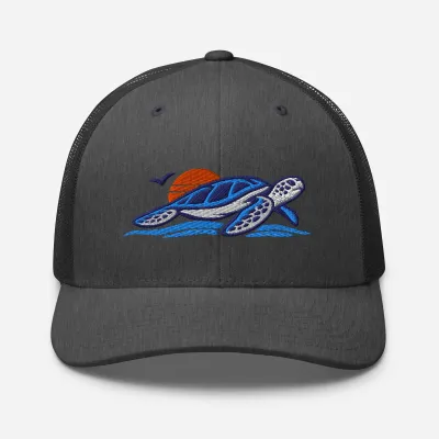 Cayrunner Sunset Turtle Trucker Cap in heather gray with embroidered sea turtle, sunset, seabird, and ocean waves