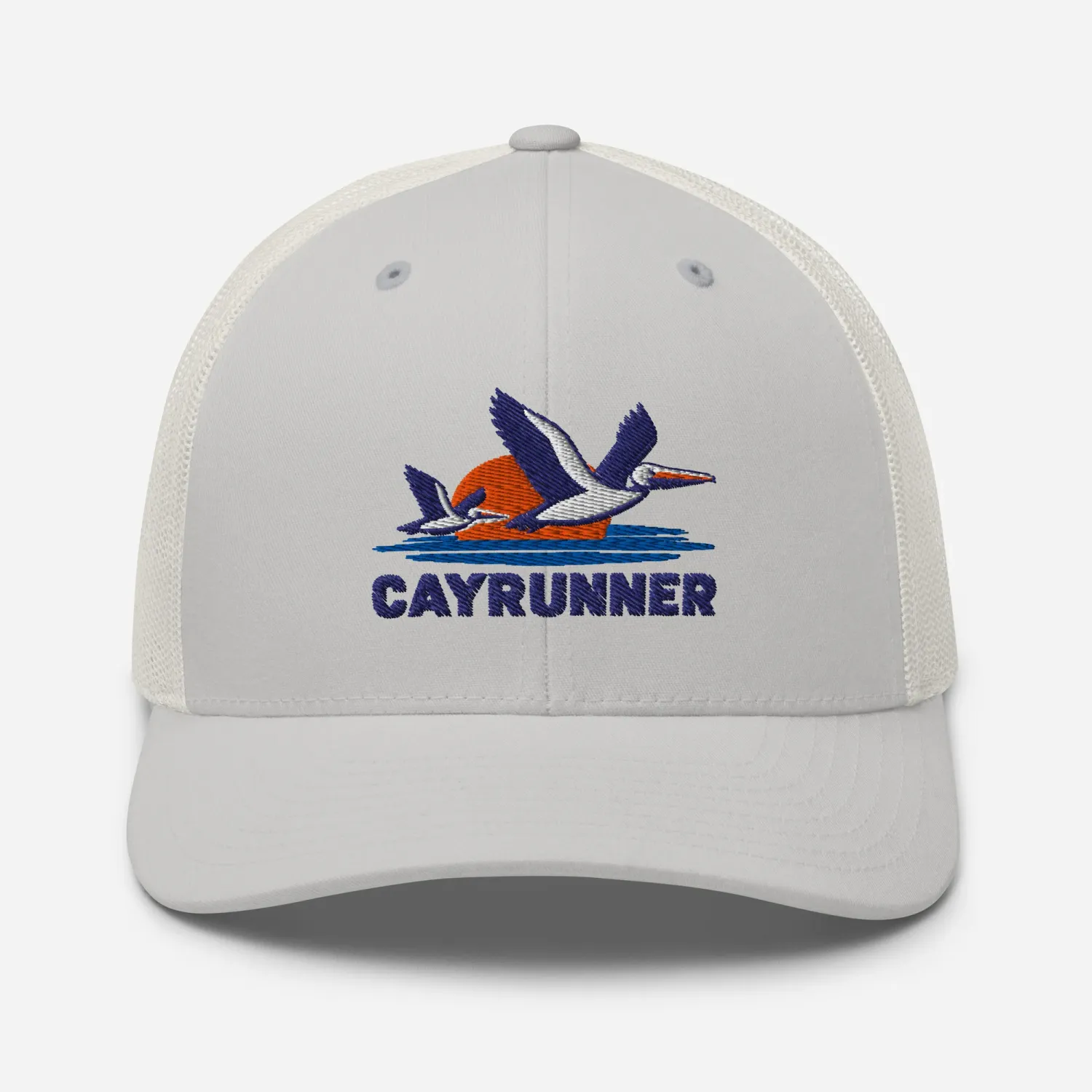 Cayrunner Pelicans Over Coastal Sun Trucker Cap in silver gray with embroidered pelicans, sunset, waves, and Cayrunner text