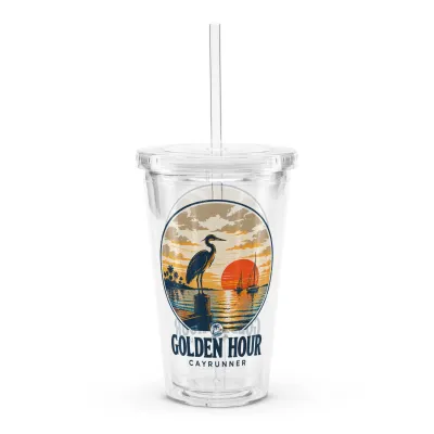 Golden Hour Cayrunner Coastal Clear Plastic Tumbler with a heron on a post at sunset with sailboats
