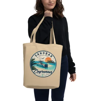 Cayrunner Anchor &amp; Unwind organic cotton tote bag, carried on the shoulder by a woman