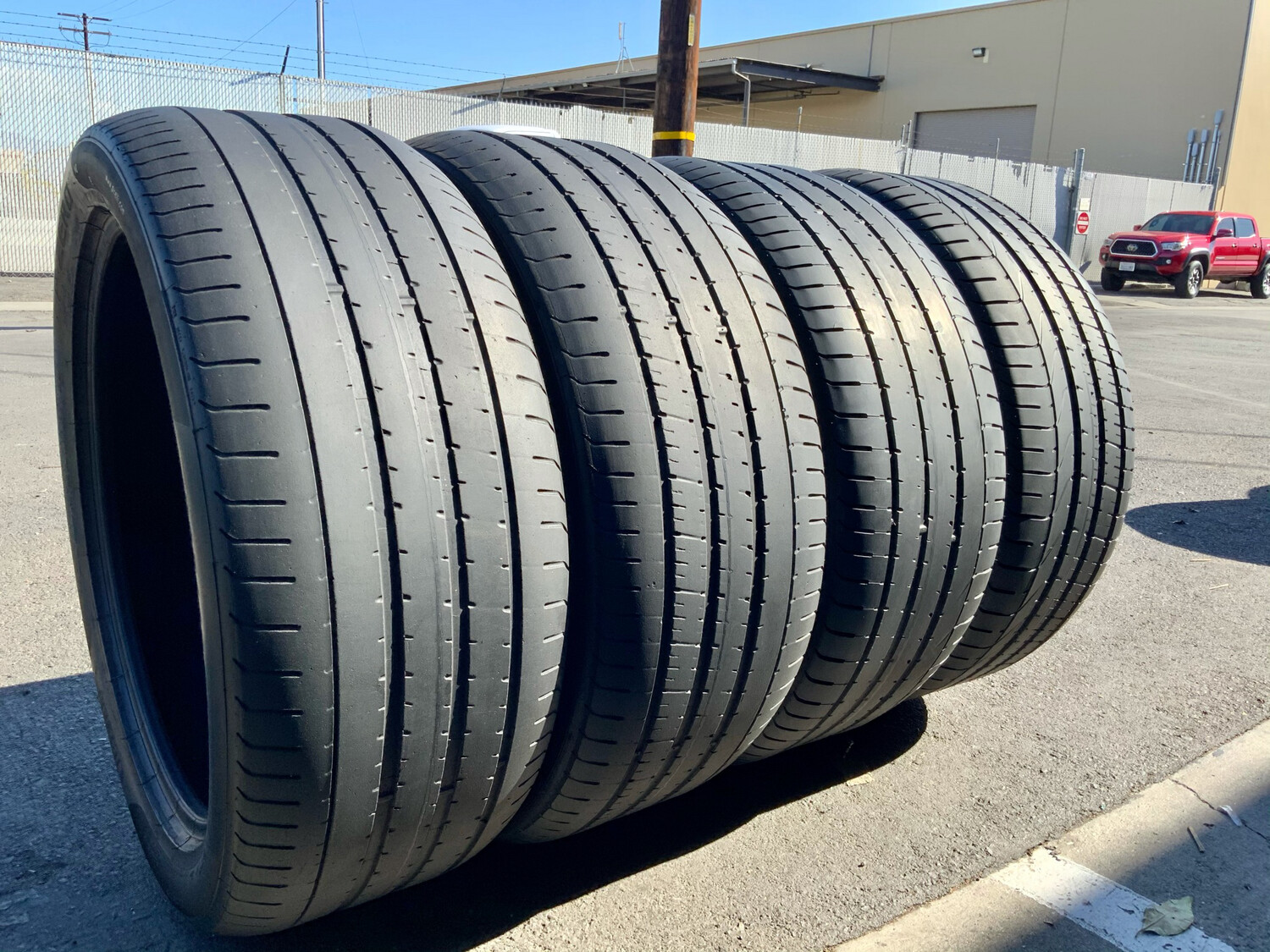 4 USED TIRES 285/40R22 Pirelli P ZERO WITH 40% TREAD LIFE 