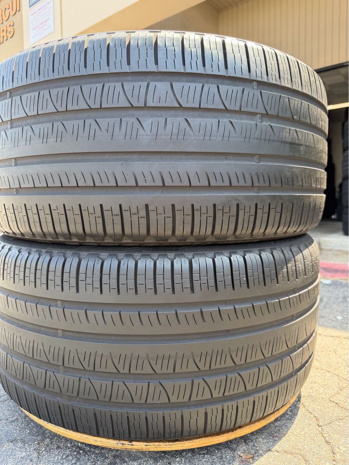 2 USED TIRES Pirelli 295/35R21 SCORPION VERDE ALL SEASON WITH 40% TREAD LIFE