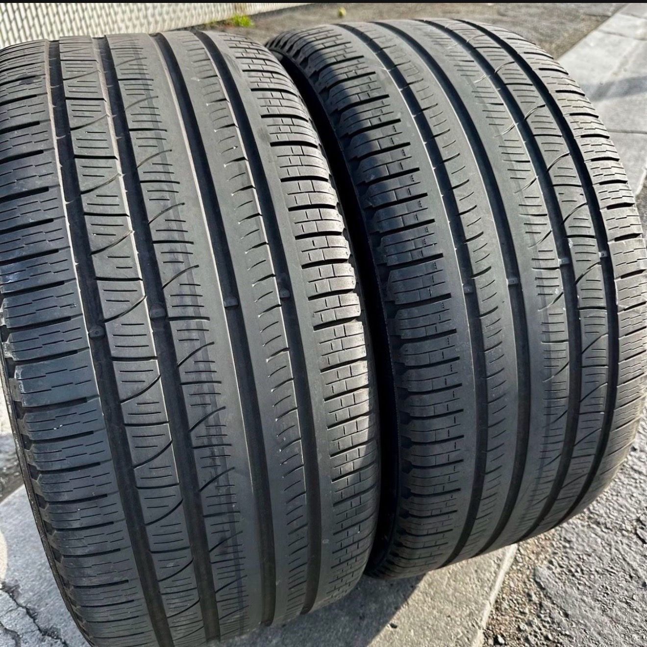 2 USED TIRES Pirelli 295/35R21 SCORPION VERDE ALL SEASON WITH 60% TREAD LIFE