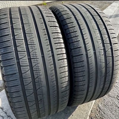 2 USED TIRES Pirelli 295/35R21 SCORPION VERDE ALL SEASON WITH 60% TREAD LIFE
