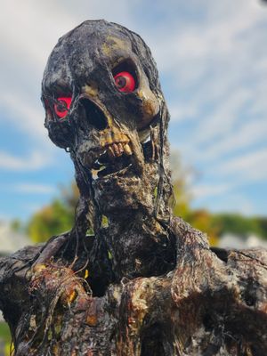 Corpsed / Rotted / Burned Skeleton with LED eyes/mouth/candle with timer