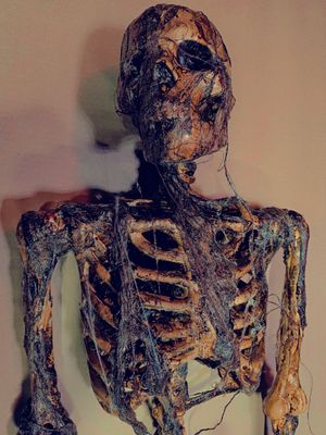Corpsed / Rotted / Burned Skeleton with LED eyes/mouth/candle with timer