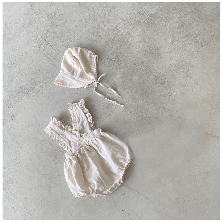 MACACÃO ALÇA DE FOLHOS