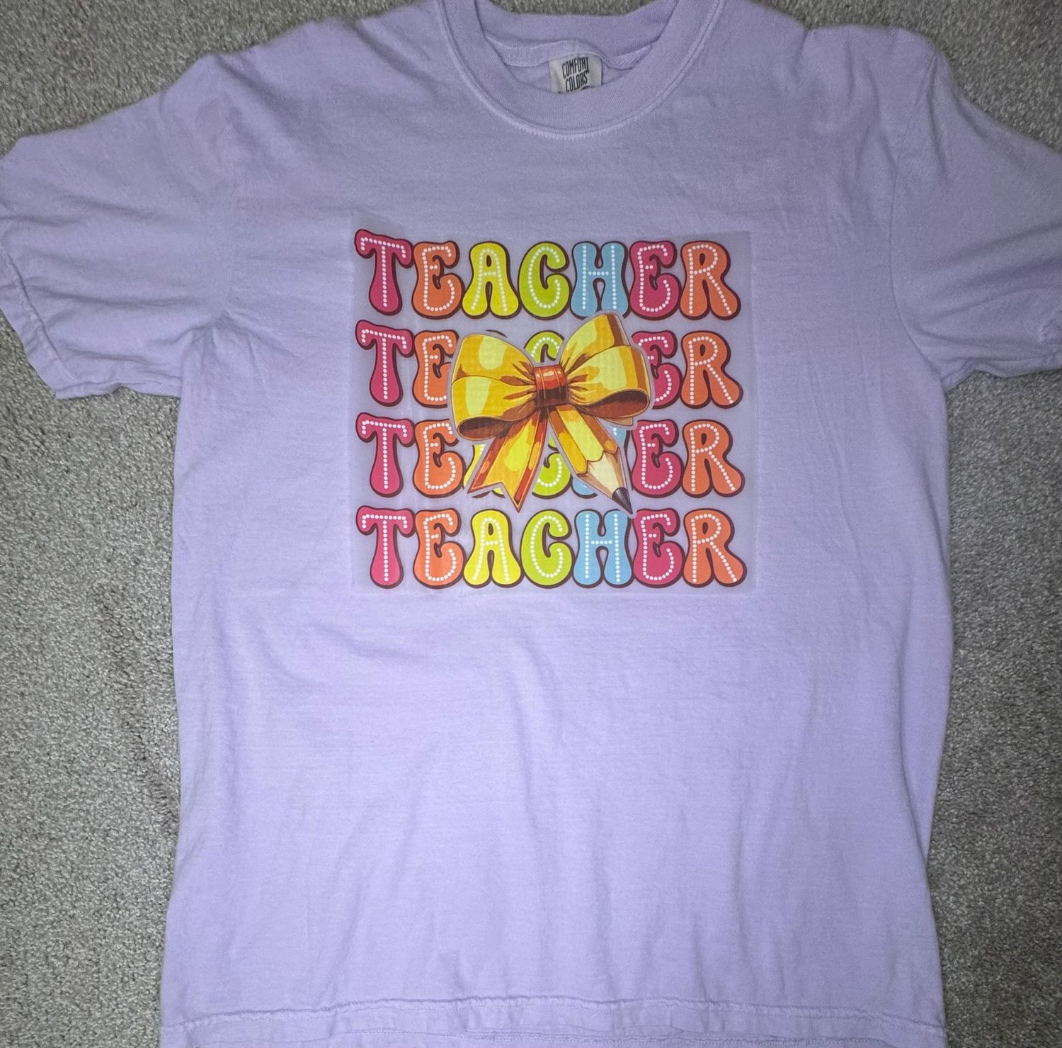 Teacher with Pencil Bow