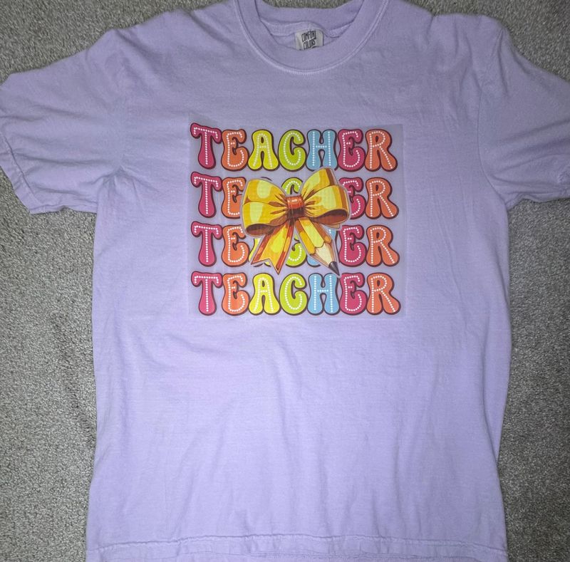 Teacher with Pencil Bow