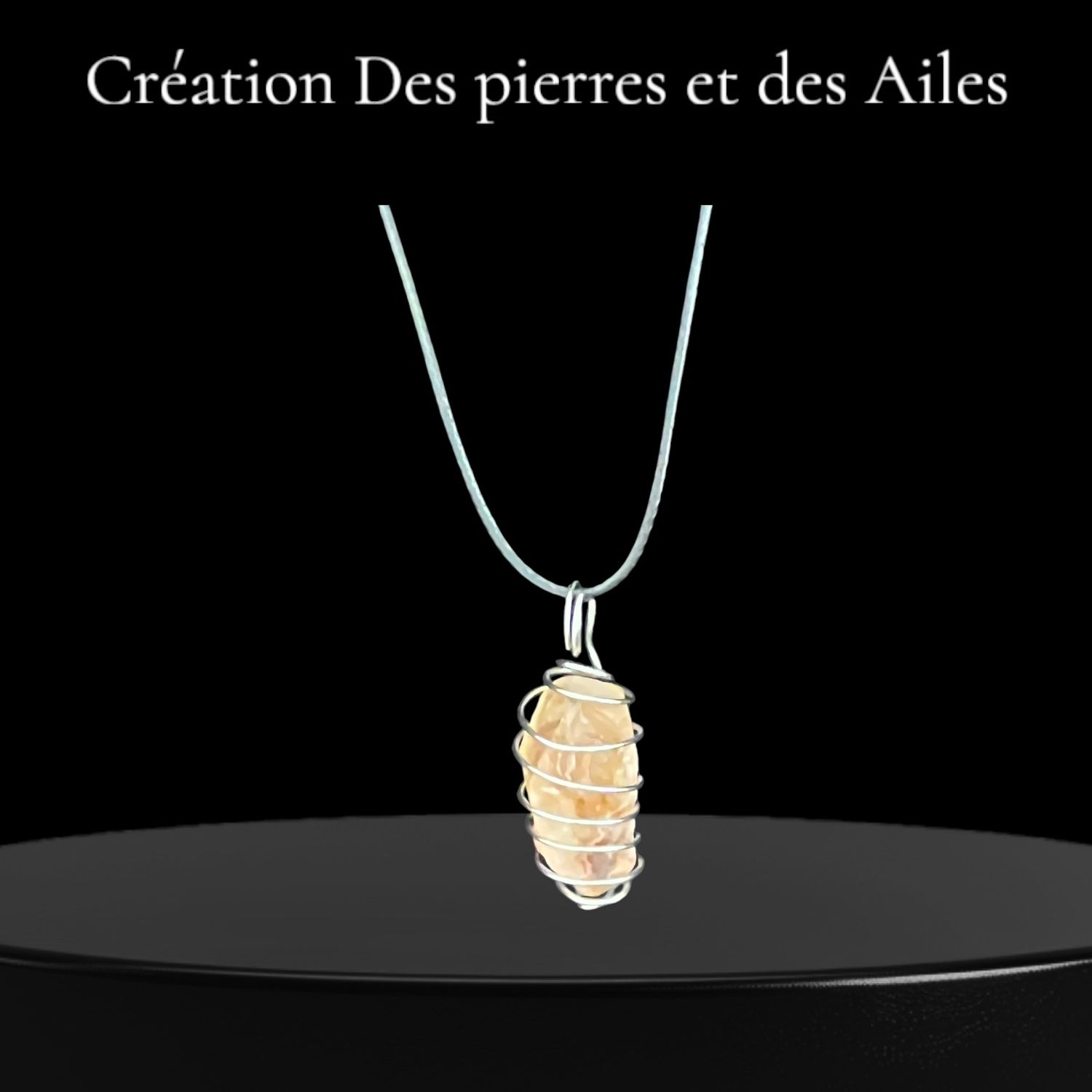 PENDENTIF PIERRE DE CITRINE DANS SA SPIRALE D&#39;ACIER