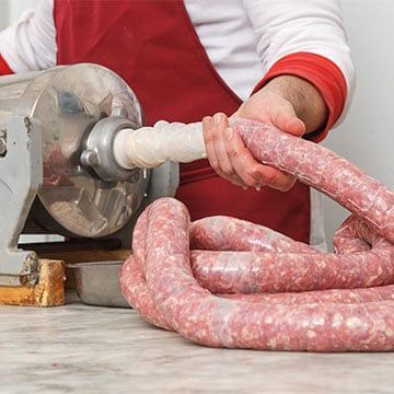 Poussoir à saucisses