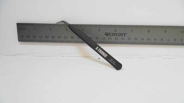 Antimagnetic Tweezers