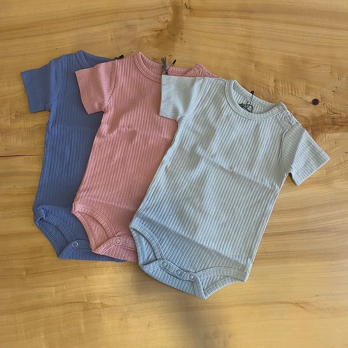 Romper ribstof