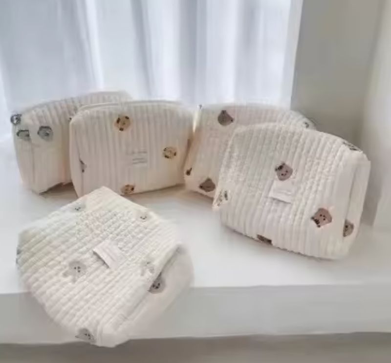 Embroidered cotton stroller bag