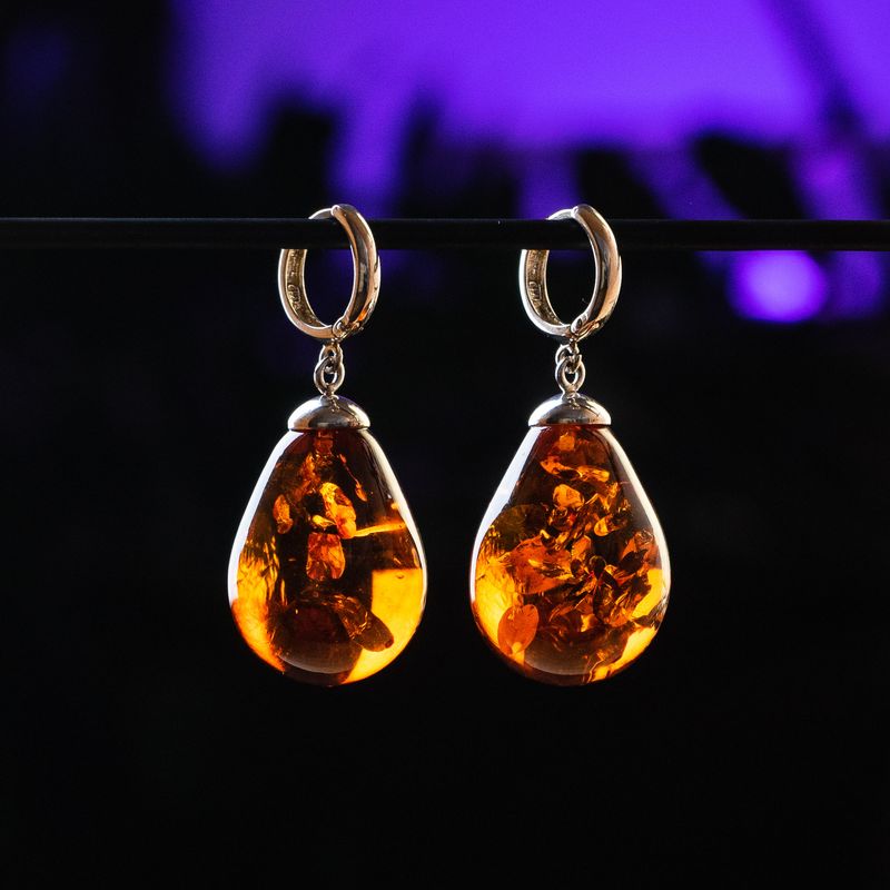 Egg shape hoop amber earrings
