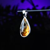 Medium asymmetrical teardrop faceted amber pendant