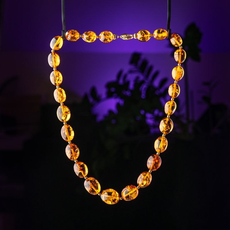 Medium plum shape amber beads necklace