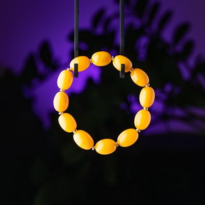 Classic polished plum shape amber beads elastic bracelet