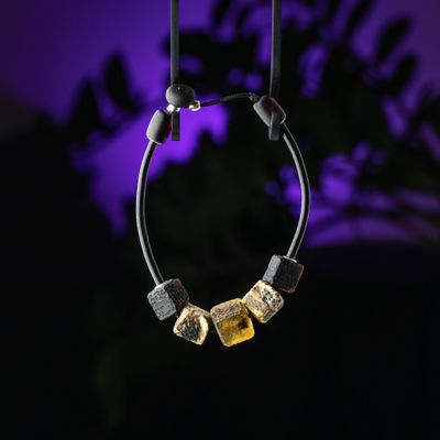 Graduated five carved amber beads leather bracelet