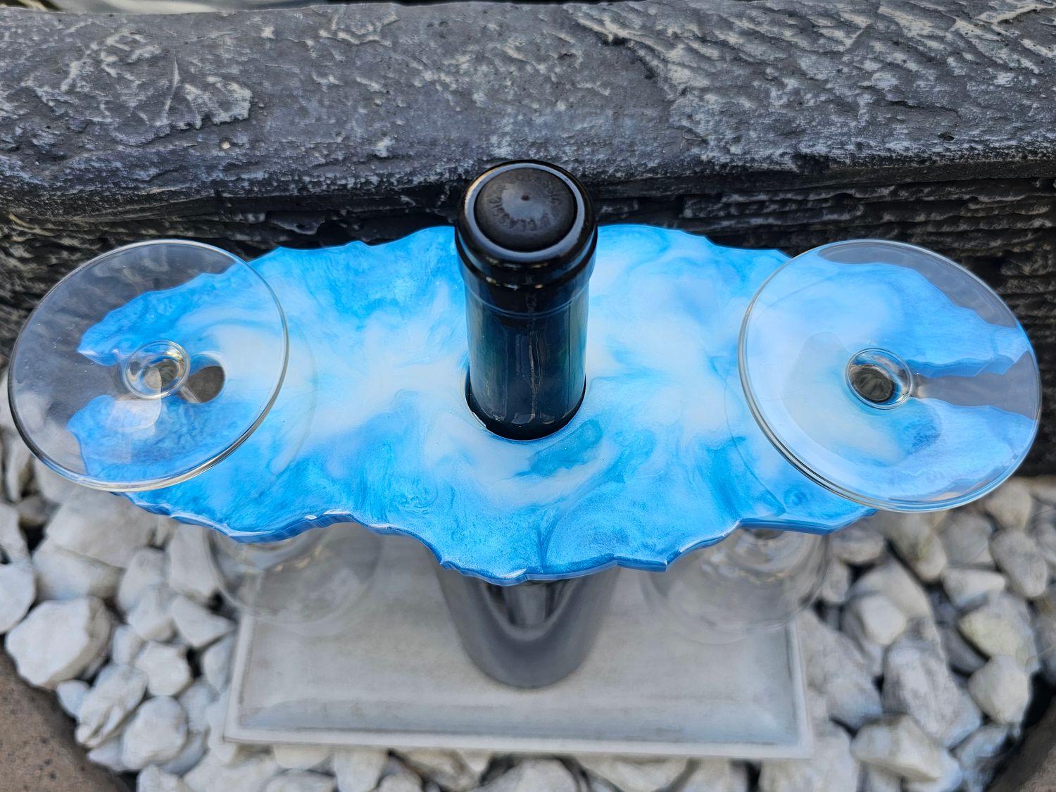 Handmade resin wine glass holder in ocean blue and white swirl