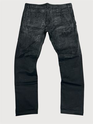 Saint Laurent Paris by Anthony Vaccarello SS2017 Distressed Waxed Denim Pants