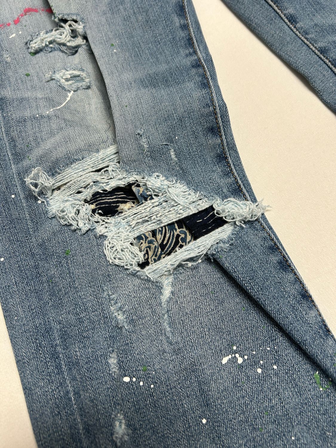 Amiri Crane Patch Paint Splatter Distressed Denim