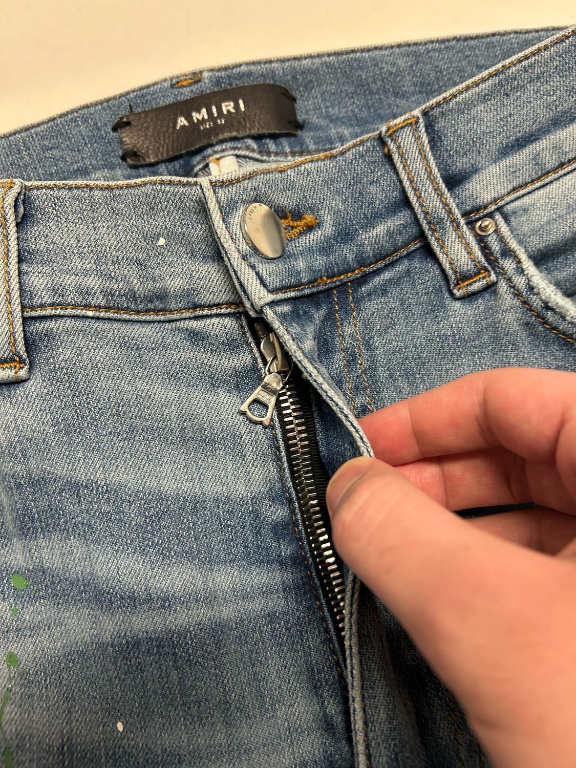 Amiri Crane Patch Paint Splatter Distressed Denim