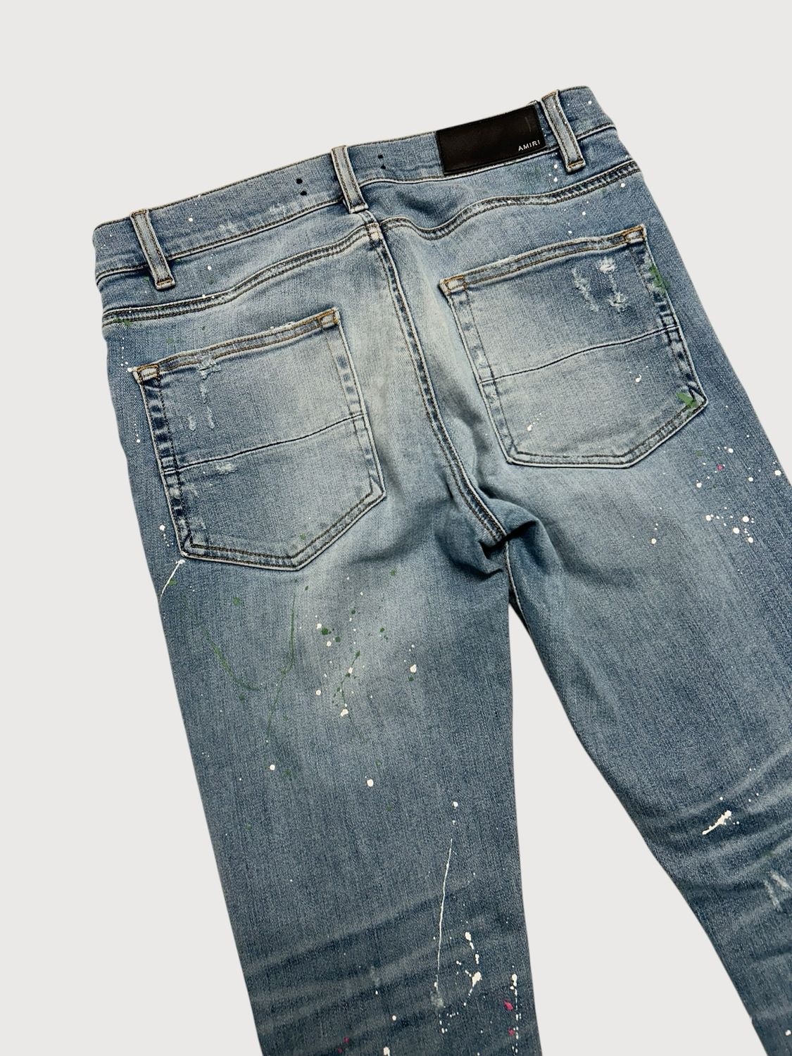 Amiri Crane Patch Paint Splatter Distressed Denim