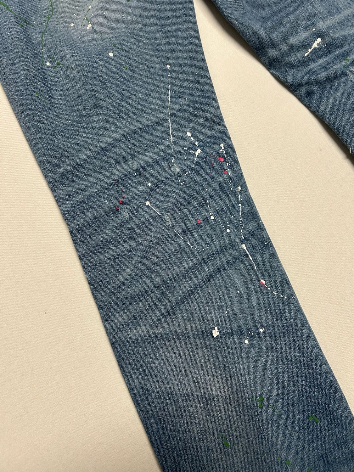 Amiri Crane Patch Paint Splatter Distressed Denim