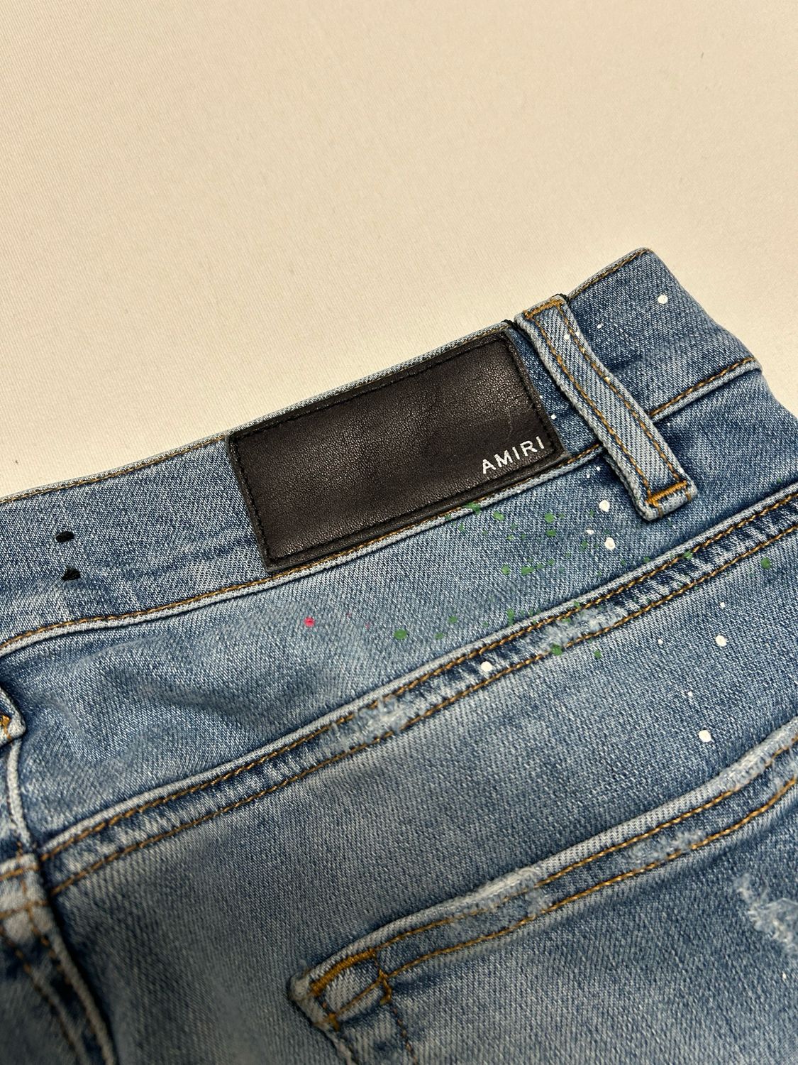 Amiri Crane Patch Paint Splatter Distressed Denim