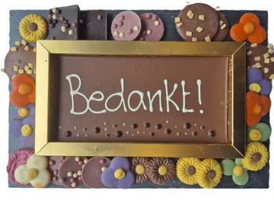 Chocoladekado met beschreven reep
